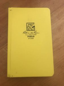 yellow field notebook